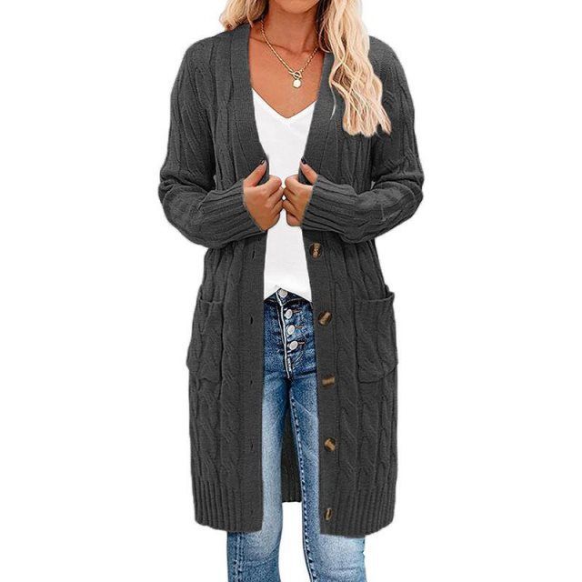 Dark gray long knitted vest with button-front and cable texture side pockets.