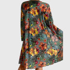 Multicolor floral cover-up over halter bikini top and high-waist bikini briefs