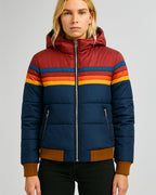 Waterproof rain coat front view with zip front, hood, rainbow striped bands, navy-blue body