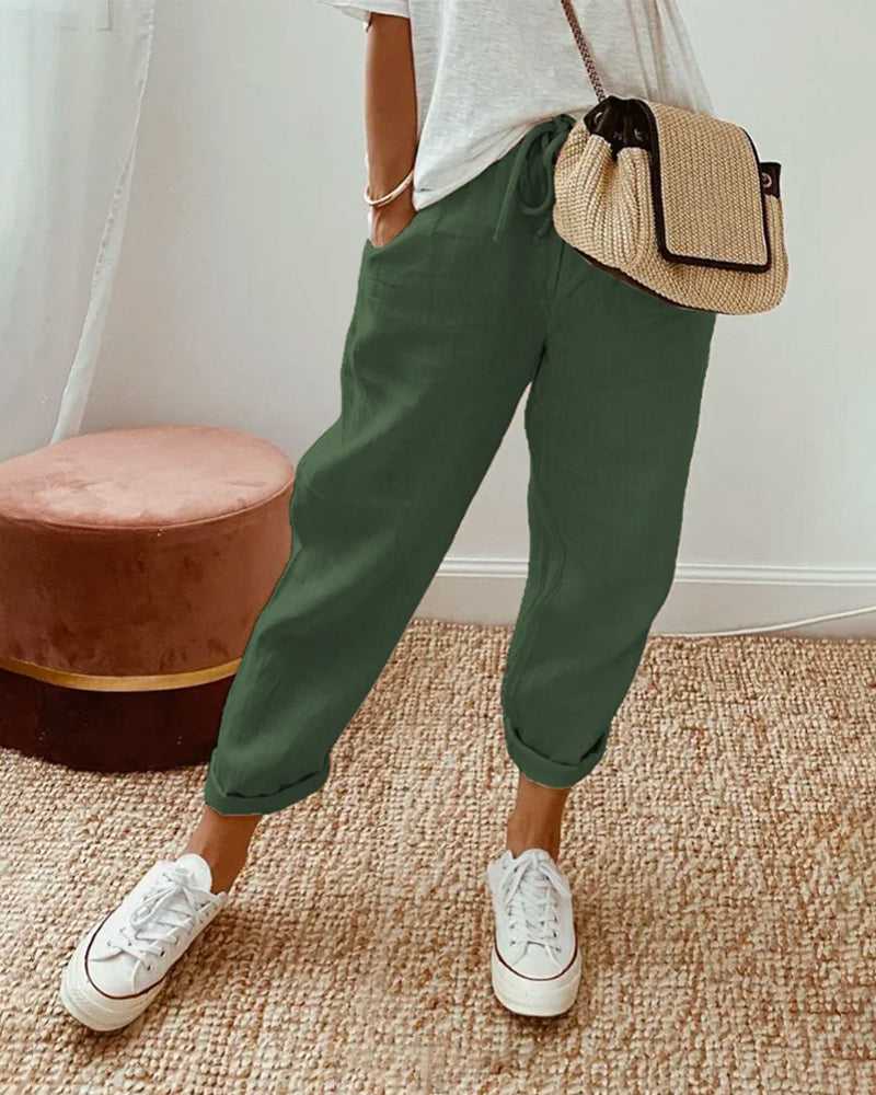 Women’s anti-sweat pants in dark green, cuffed ankle, drawstring waistband