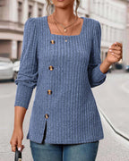 Blue ribbed knit tunic with square neckline, gold buttons, and rolled 3/4 sleeves