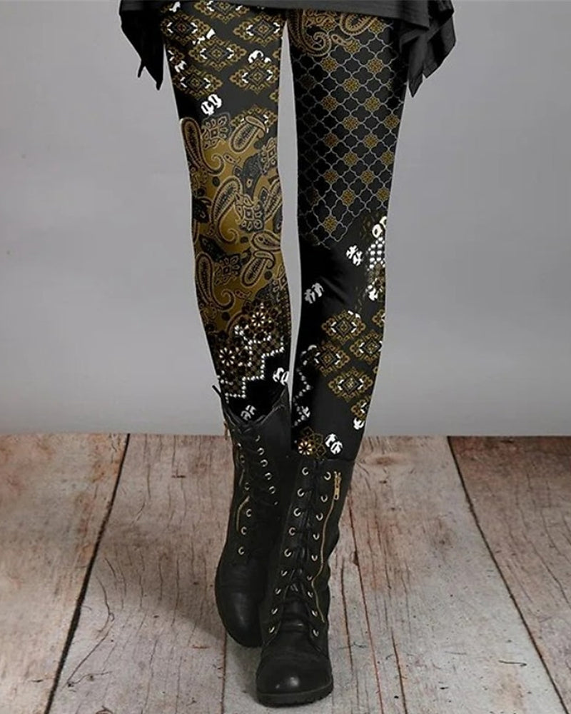 Women's boho leggings with black and gold geometric paisley print