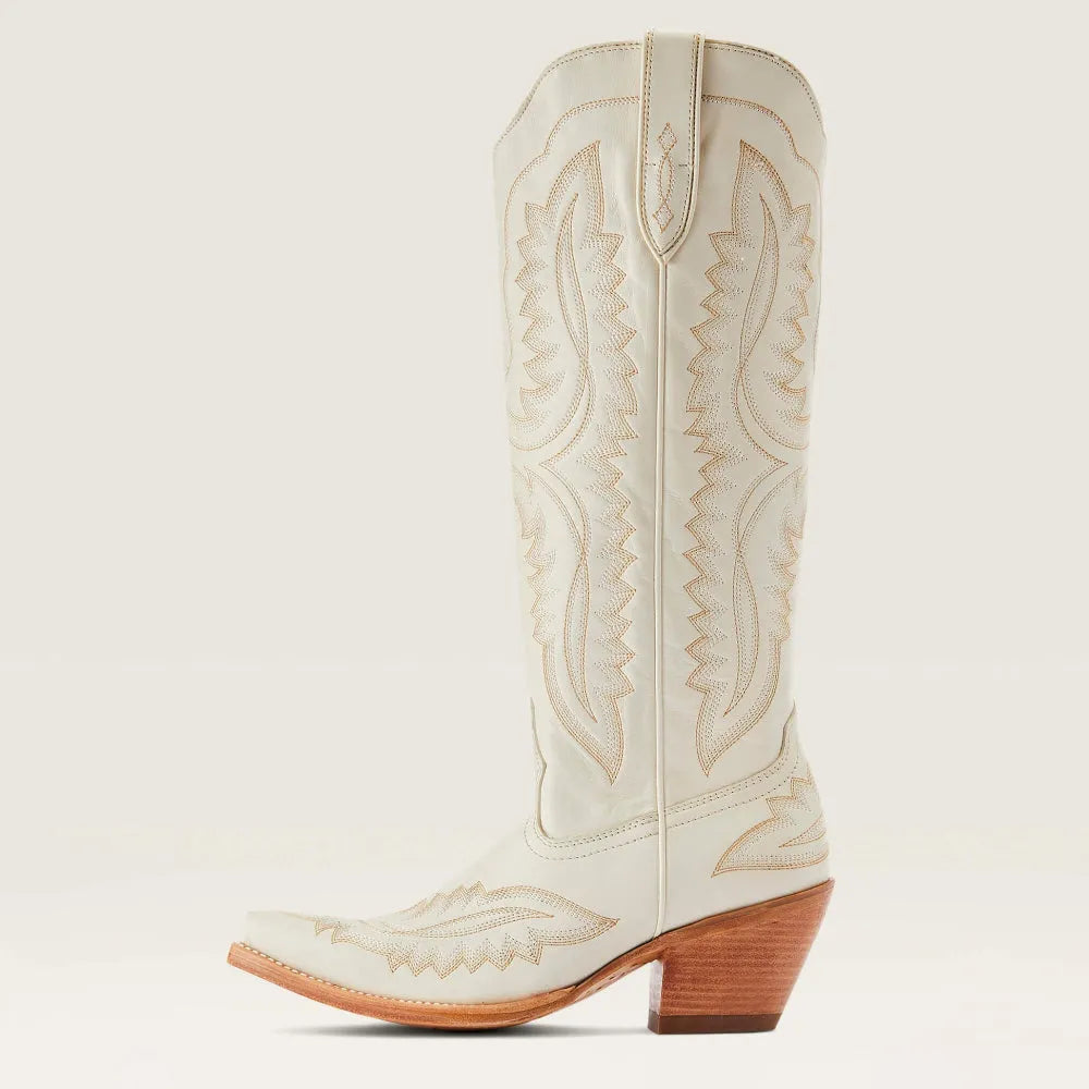 Off-white western cowboy boot with decorative embroidery and brown block heel