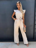 Beige wide-leg jumpsuit with flutter sleeves and waist-tie belt, front view