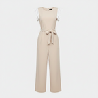 Beige wide-leg jumpsuit with flutter sleeves and tied waist belt, front view