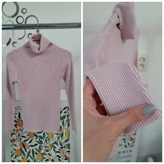 Light pink ribbed turtleneck sweater with long sleeves