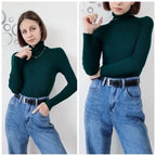 Deep green ribbed long-sleeve turtleneck sweater
