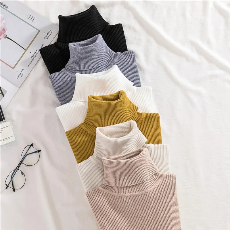 Ribbed long-sleeve turtleneck sweaters in assorted colors