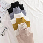 Ribbed long-sleeve turtleneck sweaters in assorted colors
