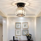 Black crystal flush mount ceiling lamp with round base and clear hanging crystal shade