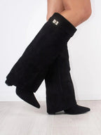 Black suede knee-high boots with wide flare cuff, gold buckle, block heel