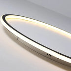 Slim round LED flush mount ceiling light, side view with warm light strip