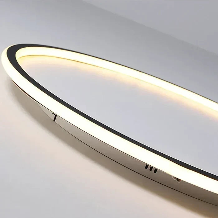 Slim round LED flush mount ceiling light, side view with warm light strip