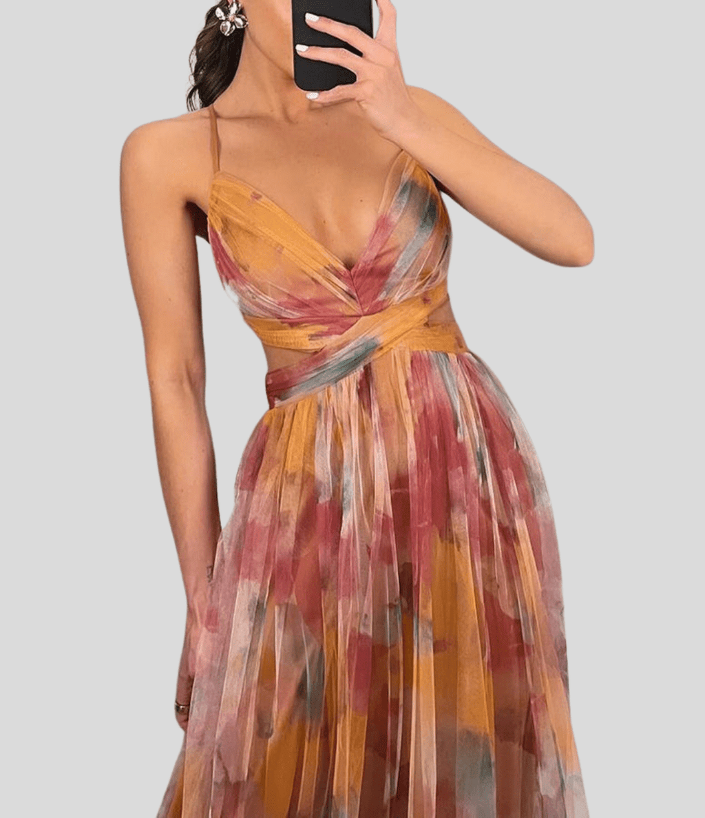 Floral maxi dress with ruffled straps and square neckline, orange and purple floral print.