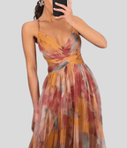 Floral maxi dress with ruffled straps and square neckline, orange and purple floral print.