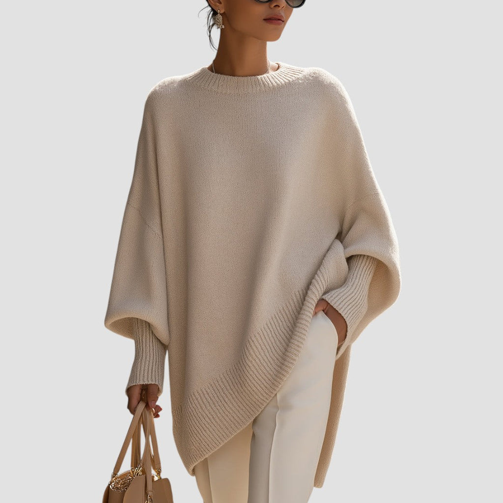 Oversized poncho sweater with ribbed crew neckline, light beige