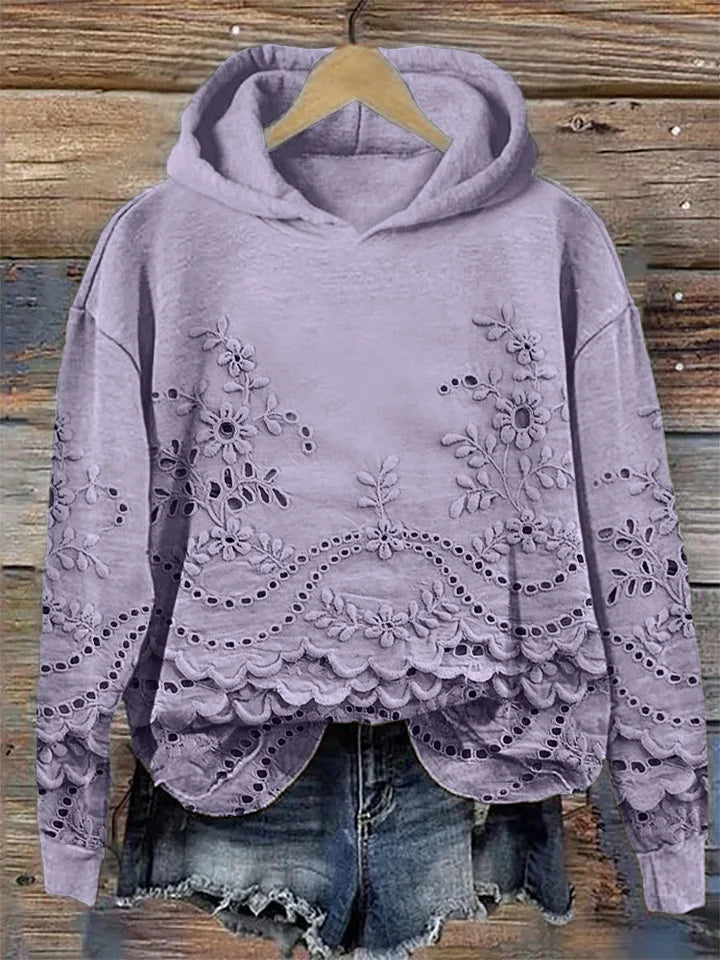 Lavender floral-embroidered hoodie with scalloped lace hem.