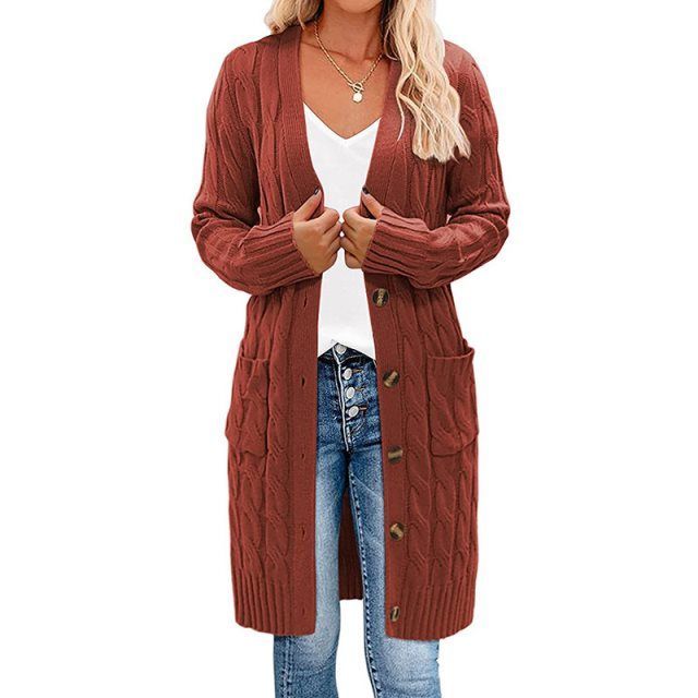 Rust red long knitted vest with button-front and cable texture side pockets.