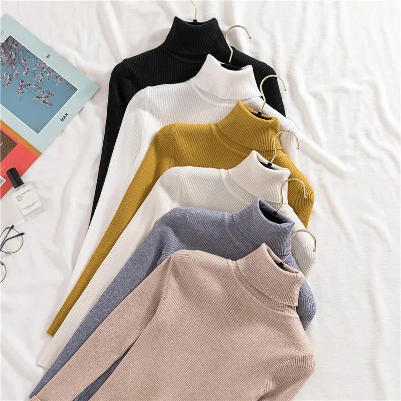 Ribbed knit turtleneck sweaters in black, white, mustard, blue-gray, taupe