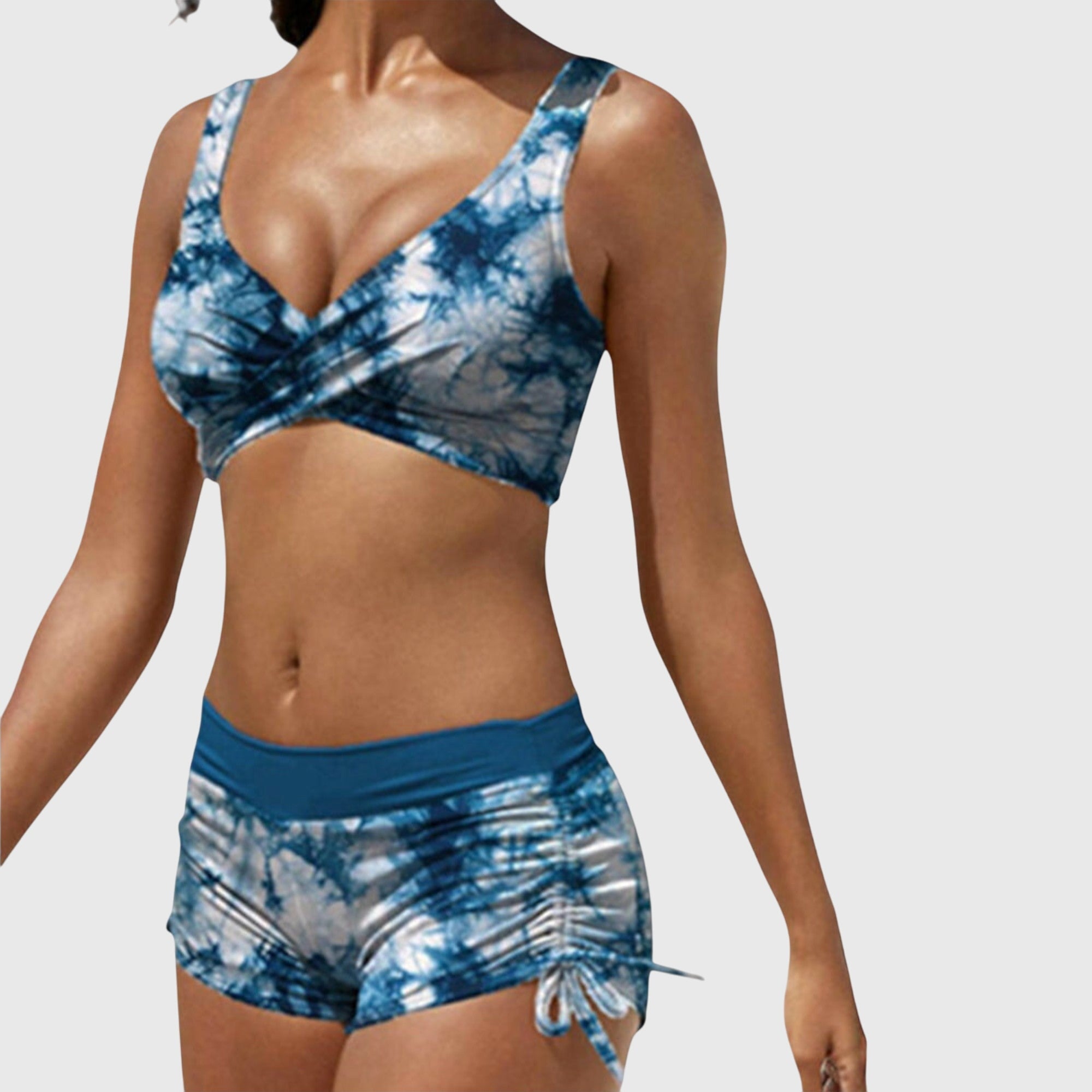 Blue tie-dye bikini set with V-neck padded top and ruched drawstring swim shorts
