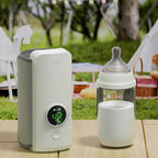 Rechargeable portable bottle warmer with green LED screen beside baby bottle