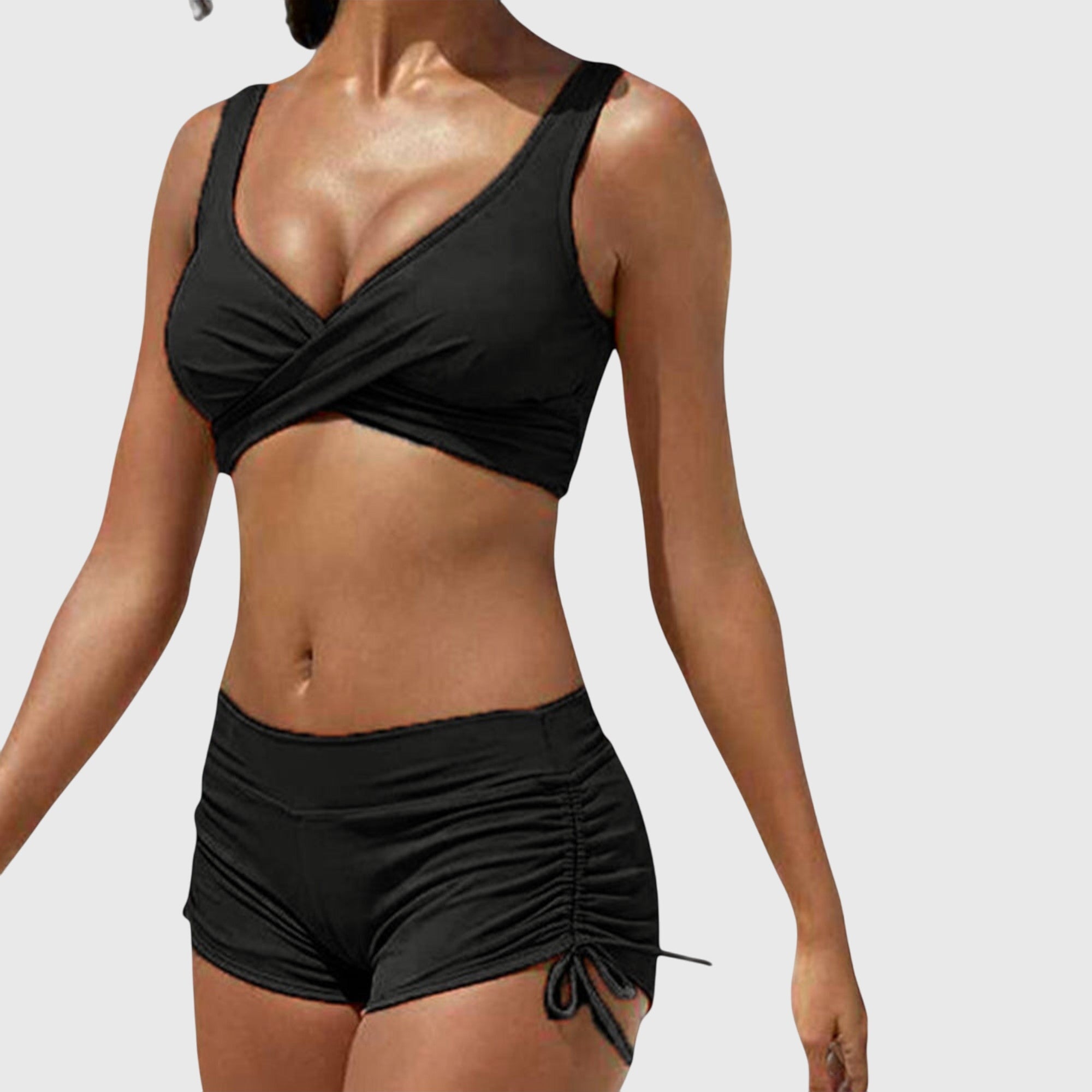 Black bikini set with cross-front bralette and ruched drawstring swim shorts