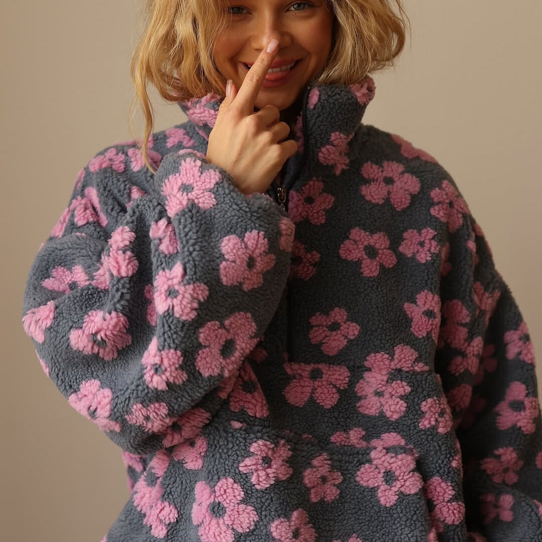 Women’s dark fuzzy quarter-zip sweater with pink floral print and zip-front collar