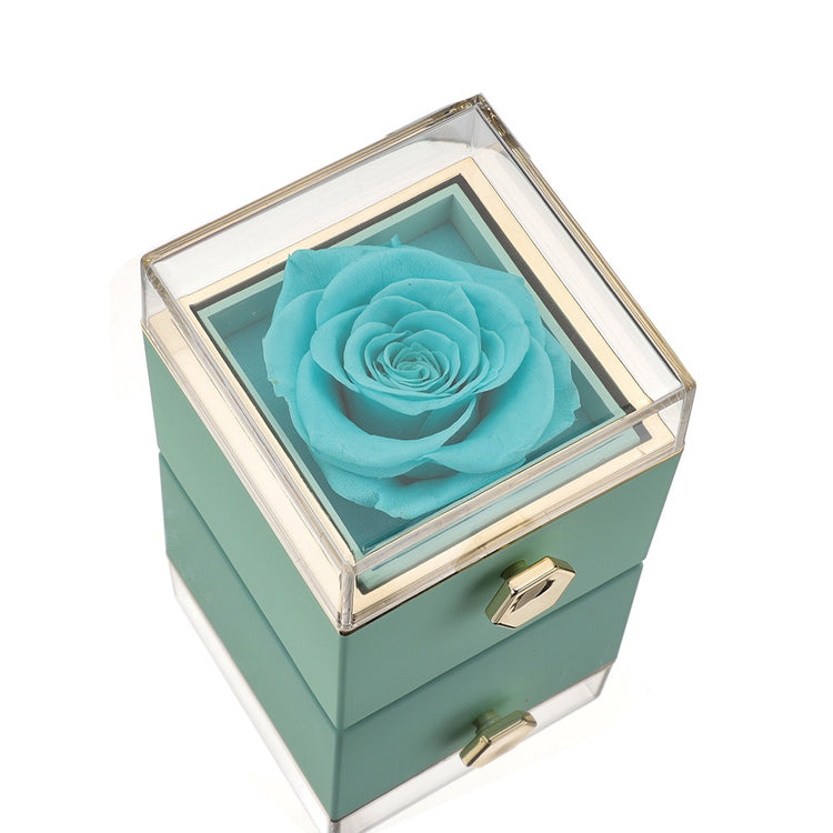 Teal keepsake gift box with clear top window and teal artificial rose centerpiece