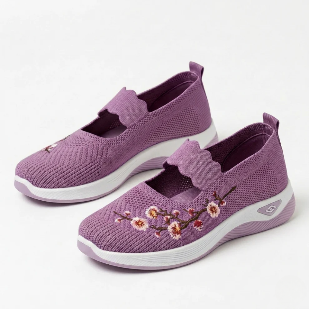 Purple knit slip-on sneakers with floral embroidery and cushioned white sole