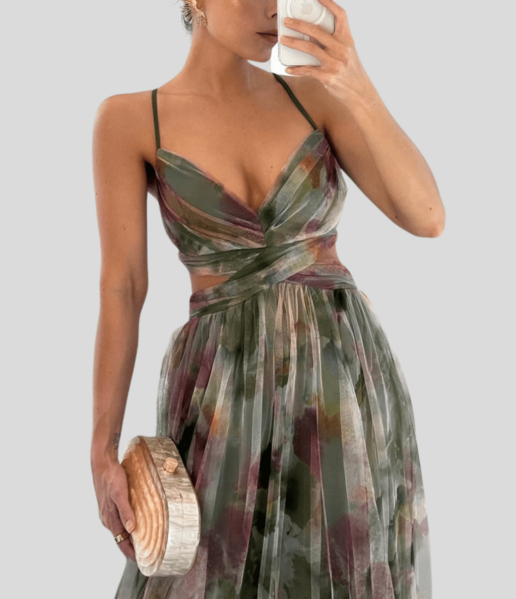 Floral maxi dress with ruffled straps, square neckline, green and burgundy floral pattern.