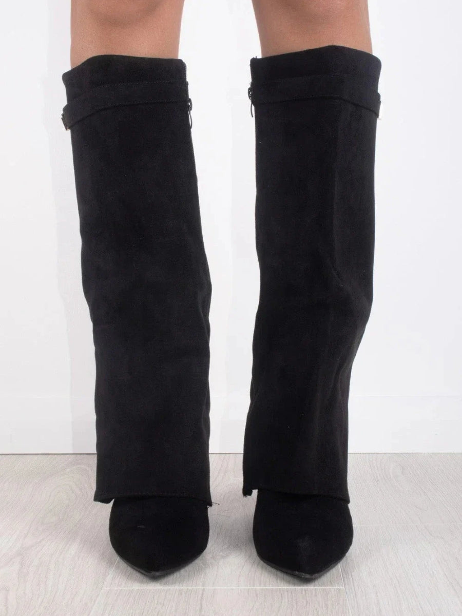 Pair of black knee-high suede boots with wide flare top and block heels