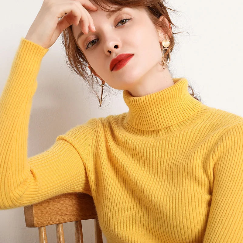 Yellow ribbed turtleneck sweater with high collar and long sleeves