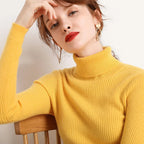Yellow ribbed turtleneck sweater with high collar and long sleeves