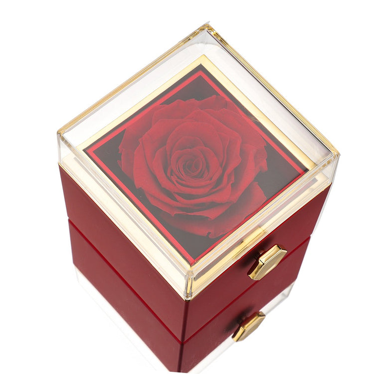 Red keepsake gift box with clear top window and red artificial rose centerpiece