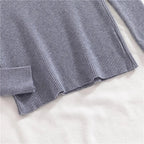 Ribbed turtleneck sweater in slate blue-gray, hem and long sleeve cuff detail