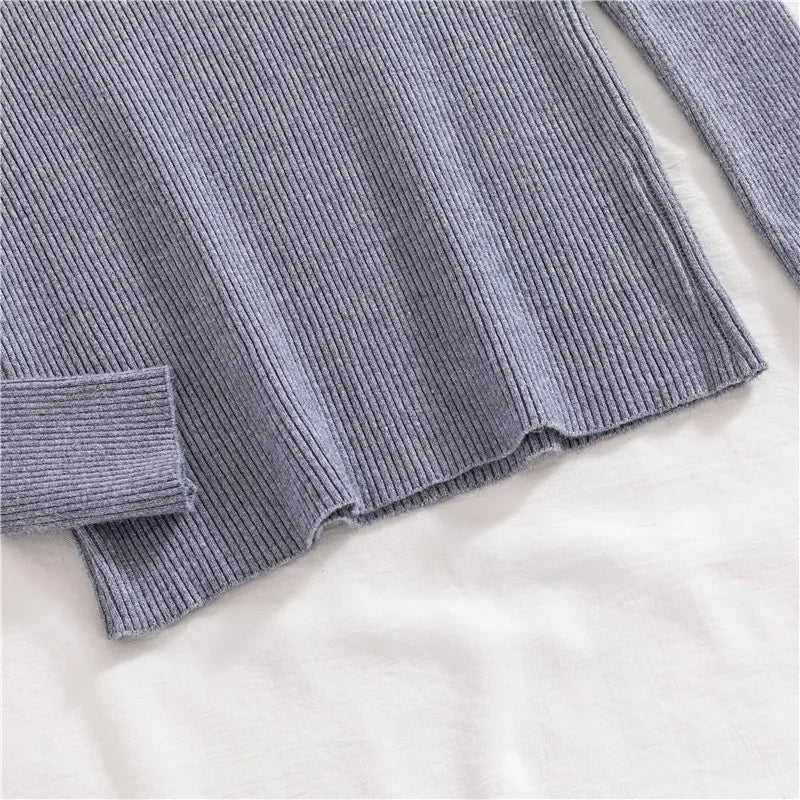 Ribbed turtleneck sweater in slate blue-gray, hem and long sleeve cuff detail