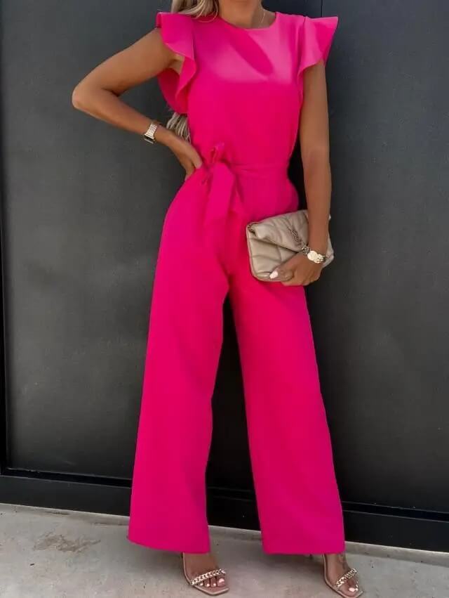 Pink wide-leg jumpsuit with flutter sleeves and waist-tie belt, front view