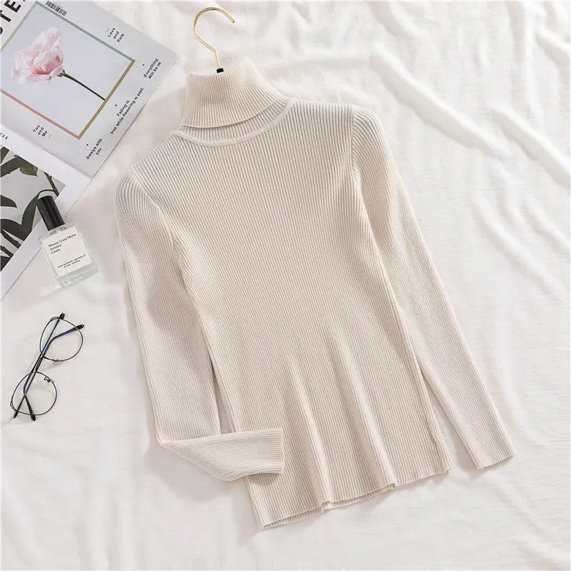 Ribbed turtleneck sweater in off-white/cream with long sleeves and mock neck
