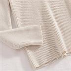 Ribbed turtleneck sweater in off-white/cream, long sleeve and cuff detail