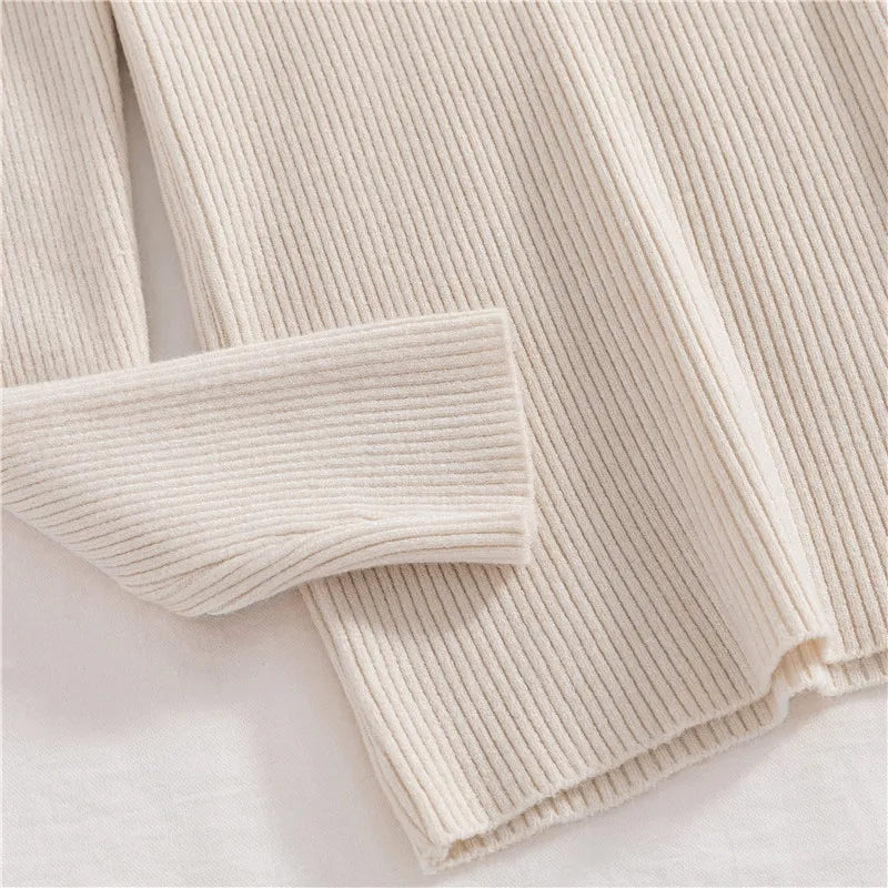 Ribbed turtleneck sweater in off-white/cream, long sleeve and cuff detail