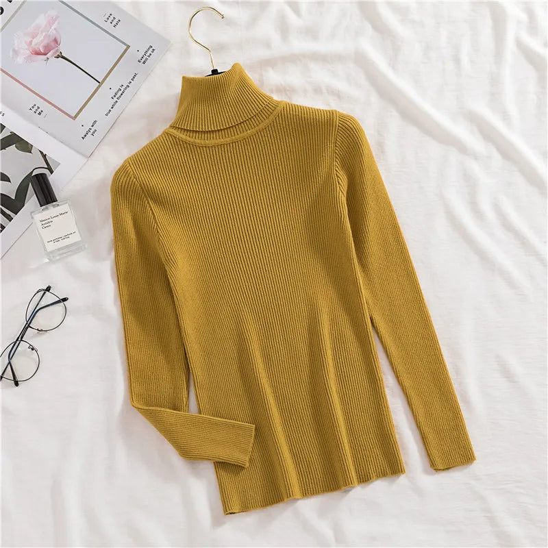Ribbed turtleneck sweater in mustard yellow with long sleeves and mock neck