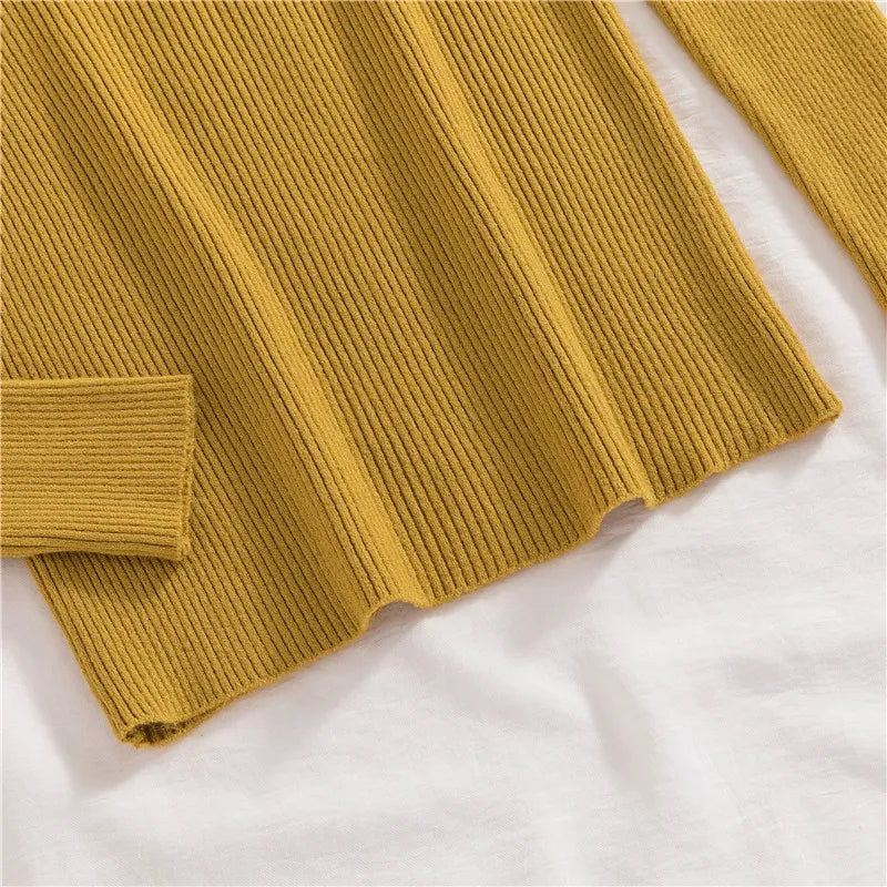 Mustard ribbed knit turtleneck sweater, long sleeves and hem detail