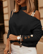 Black asymmetrical cold-shoulder sweater with round button detail at cuffs