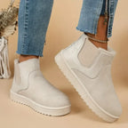 White suede low-cut slip-on boots with side elastic gore and faux-fur cuff