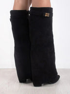 Black suede knee-high boots with wide top band, gold buckle, and block heel
