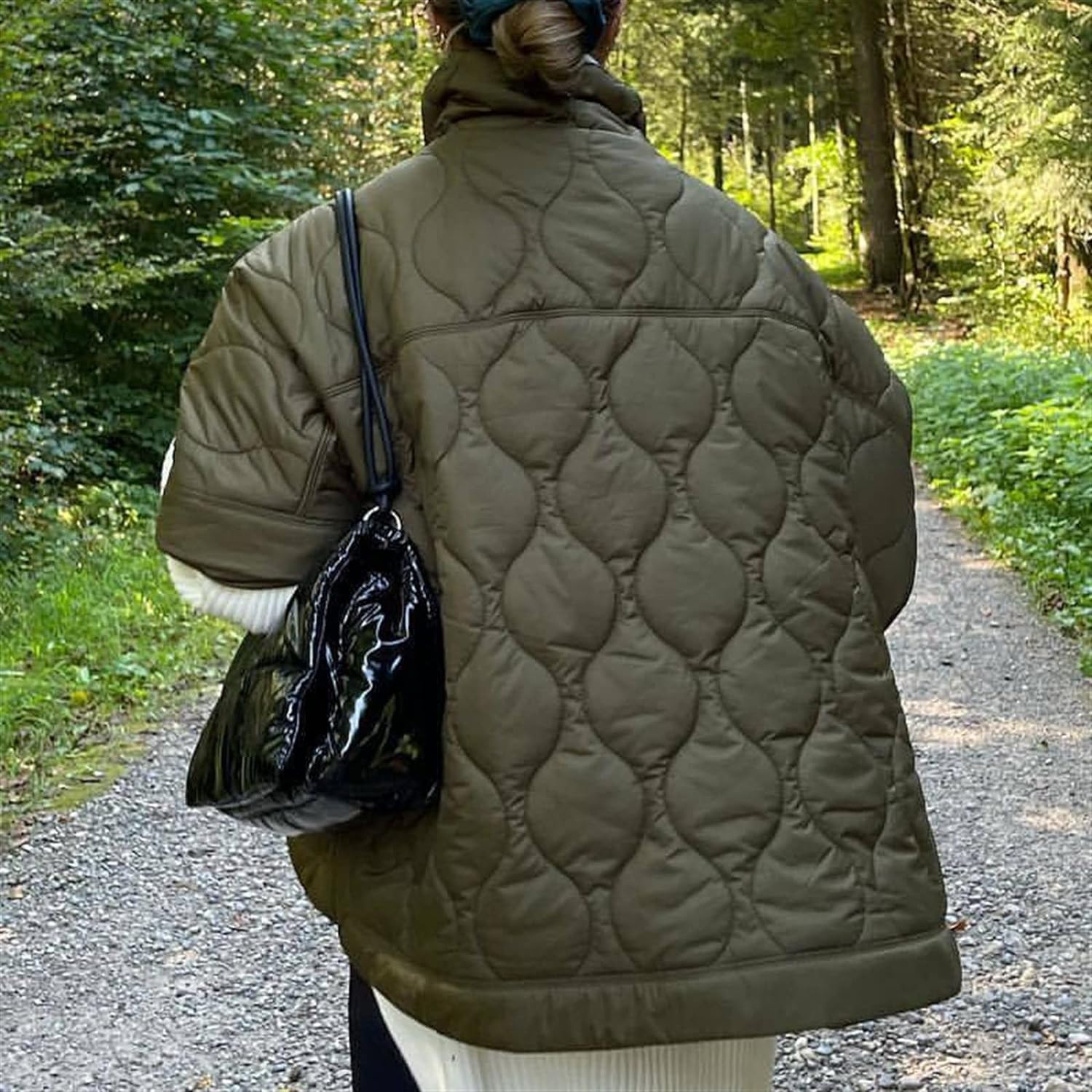 Olive quilted hooded jacket with circular pattern, back view