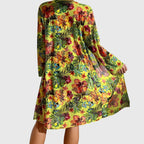 Multicolor floral cover-up over halter bikini top and high-waist bikini briefs
