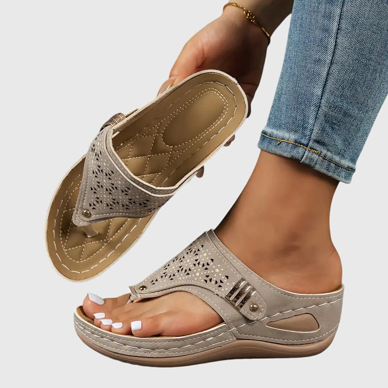 Women's wedge sandals in light taupe, perforated slide with buckle strap and wedge heel