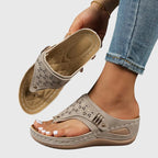 Women's wedge sandals in light taupe, perforated slide with buckle strap and wedge heel