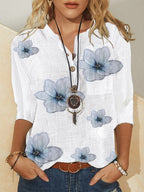 White floral button-front blouse, light blue blooms, 3/4 sleeves